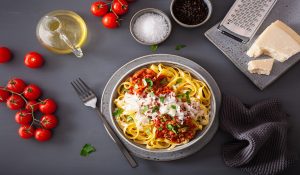 bolognese with herbs and parmesan